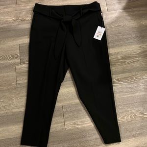 Black slacks. Slim fit and stretch